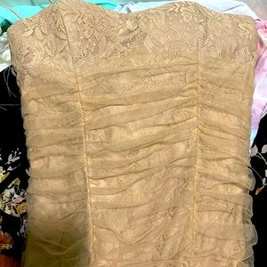 Small nude dress brand new, never used